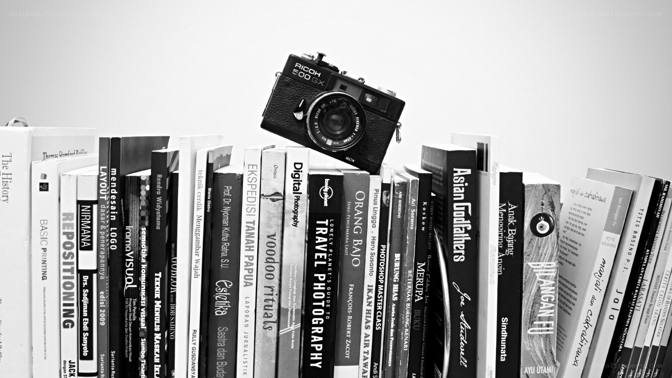 camera on bookshelf