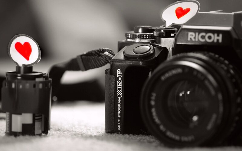camera with heart icons