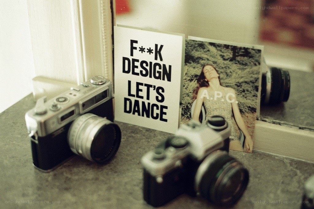 cameras and a sign