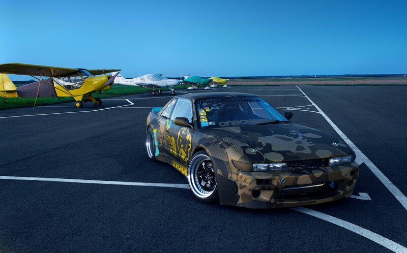 Camouflage Car on Tarmac