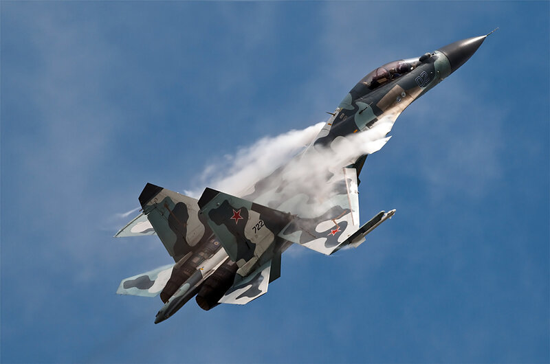 Camouflage Fighter Jet — Blue, Dynamic, Afternoon, Photograph, Smoke, Sky, Red Star