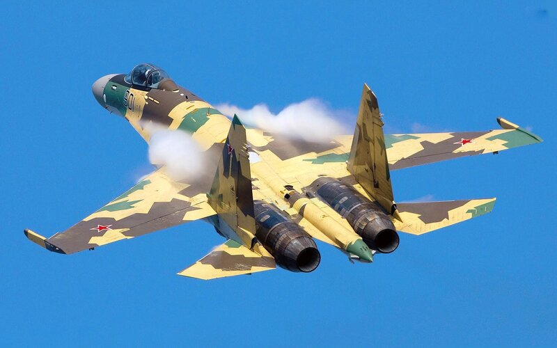 Camouflage Fighter Jet — Blue, Dynamic, Afternoon