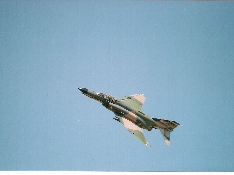 Camouflage Fighter Jet — Blue, Dynamic, Photograph
