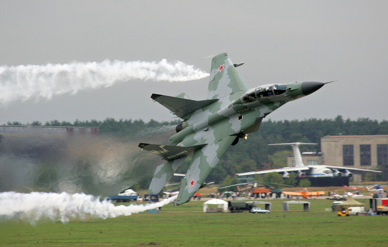 Camouflage Fighter Jet — Green, Dramatic, Afternoon