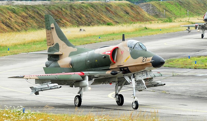Camouflage Jet on Runway