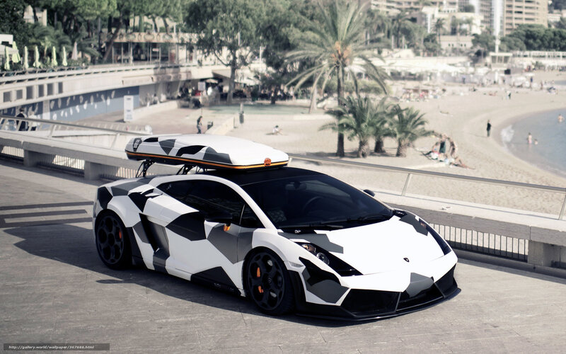 camouflage Lamborghini on beach promenade