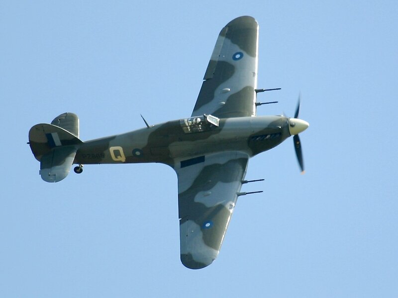 Camouflage-painted Airplane — Blue, Calm