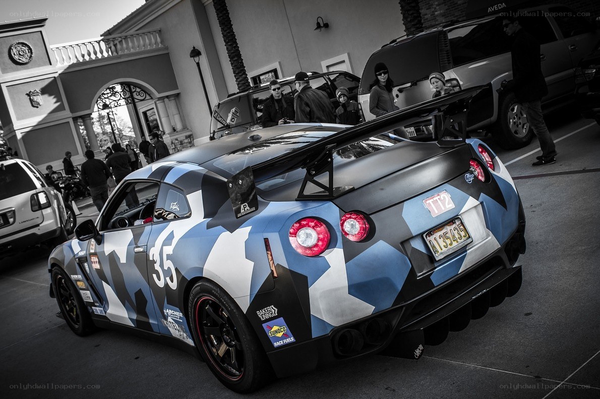 camouflage race car at event