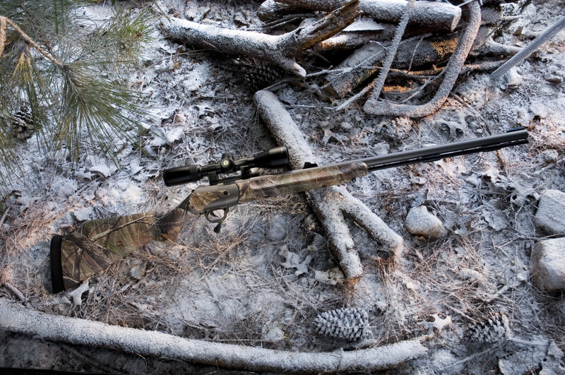 Camouflage Rifle in Snow