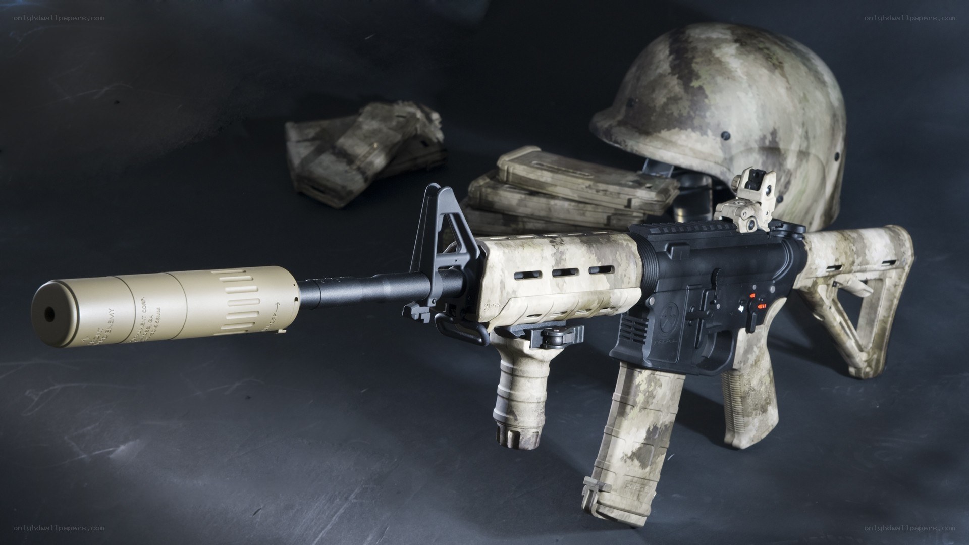 camouflage rifle with gear