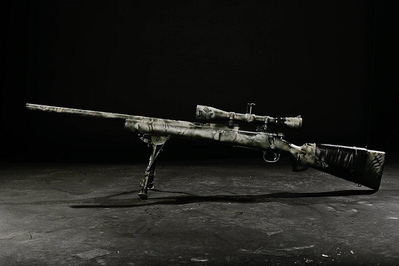 camouflage sniper rifle