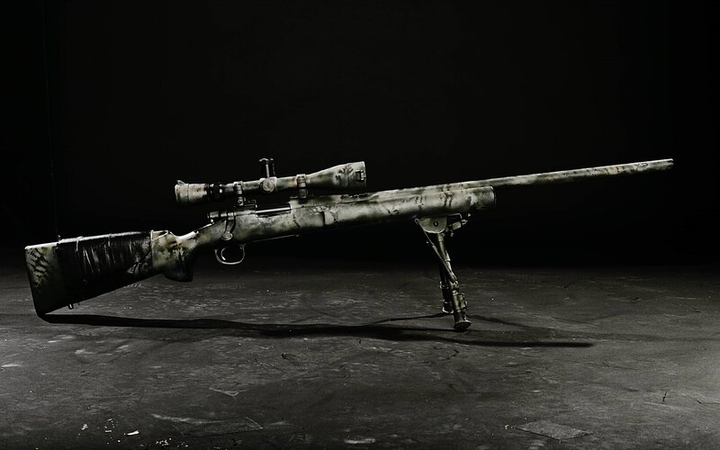 camouflage sniper rifle