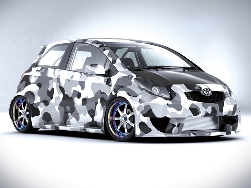 camouflage Toyota hatchback