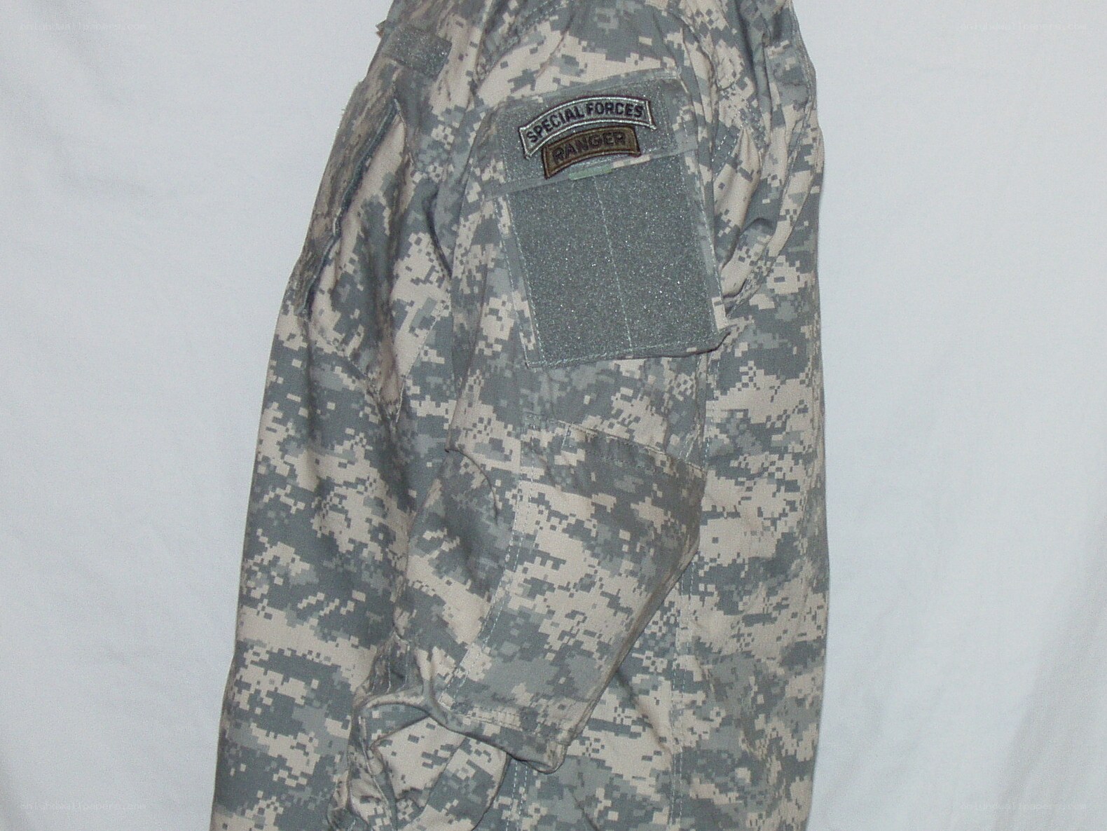 camouflage uniform with ranger patch
