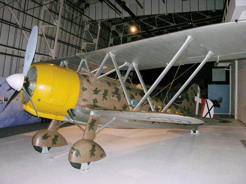 Camouflaged Biplane Aircraft