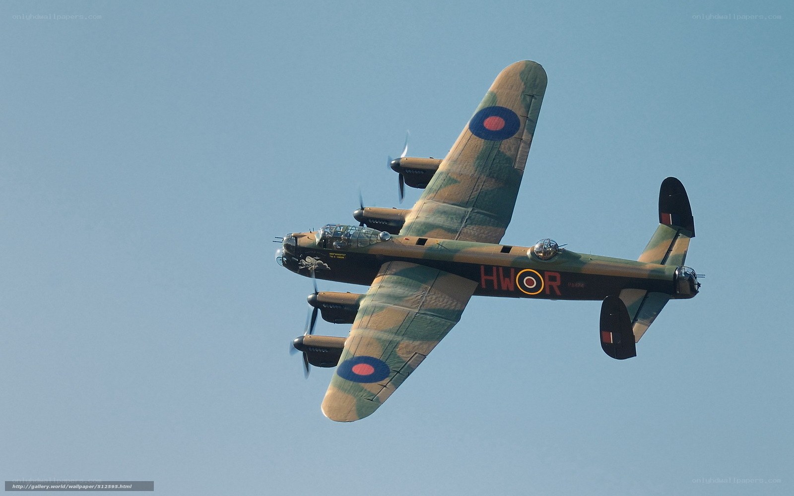 Camouflaged bomber in flight