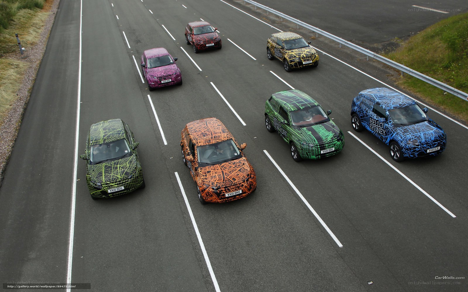 camouflaged cars on highway
