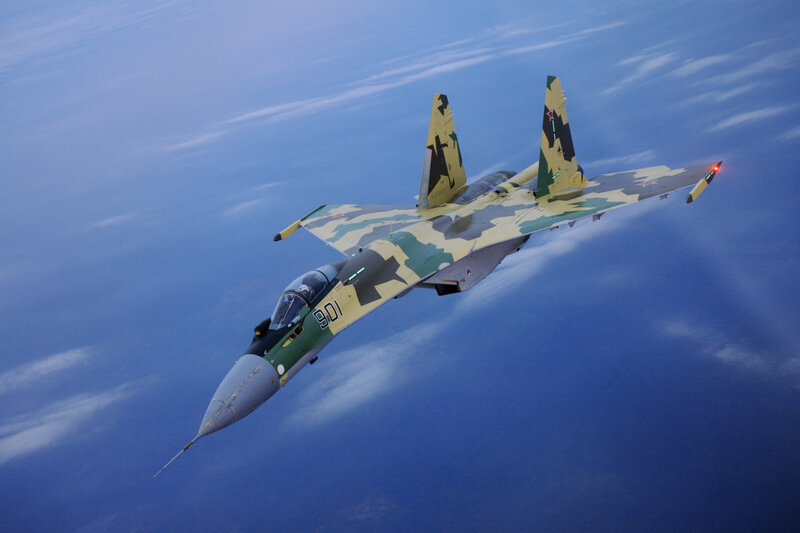 Camouflaged Fighter Jet — Blue