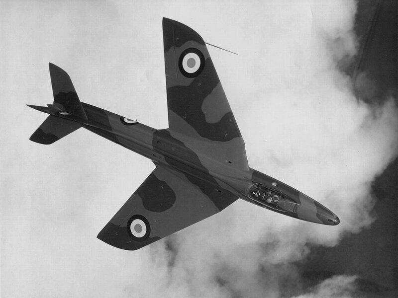 Camouflaged jet in flight