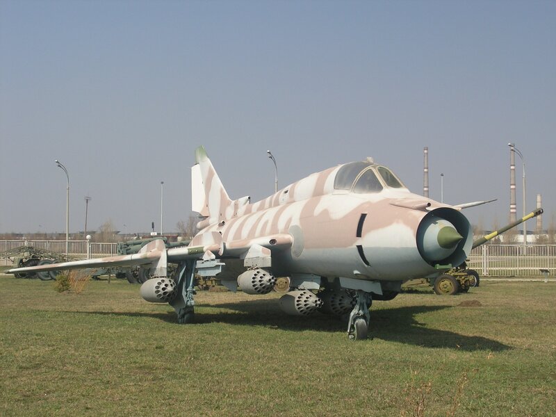 camouflaged jet on display