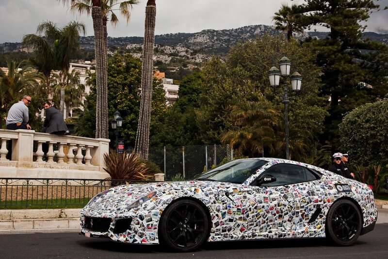 Camouflaged sports car on display