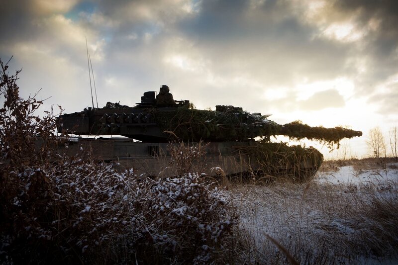 Camouflaged Tank in Field — Gray