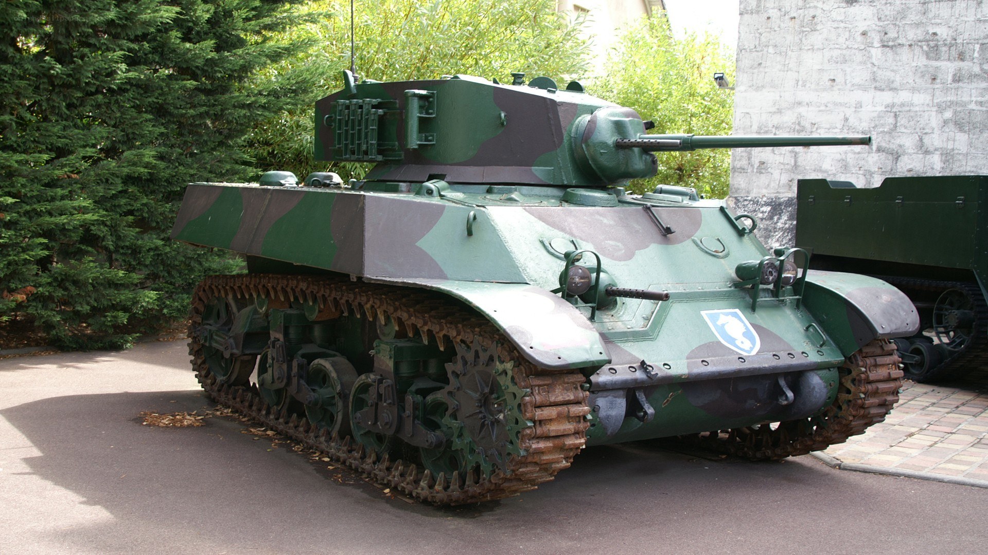 Camouflaged tank on display