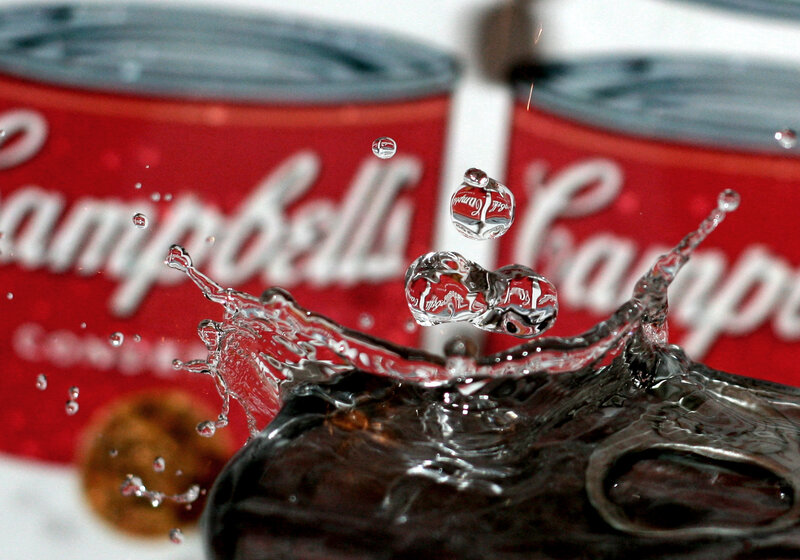 Campbell's soup cans with water splash