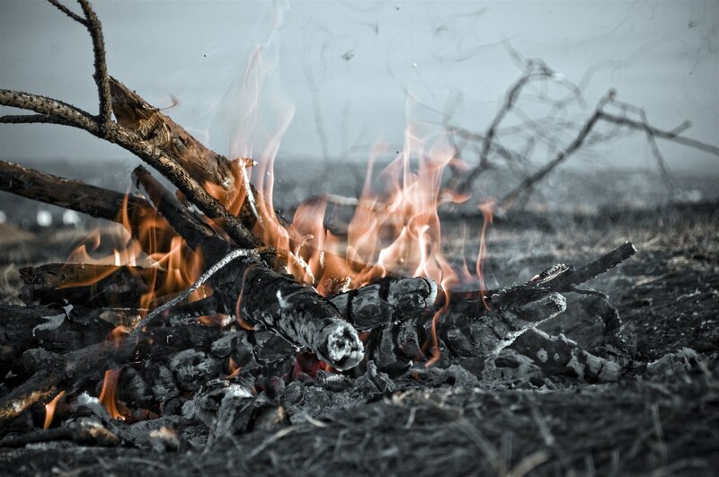 Campfire burning at dusk