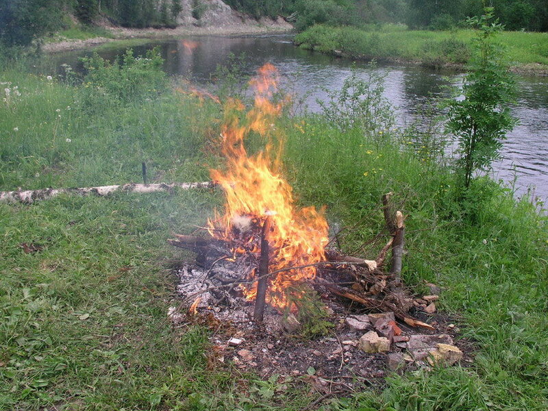 Campfire by a river