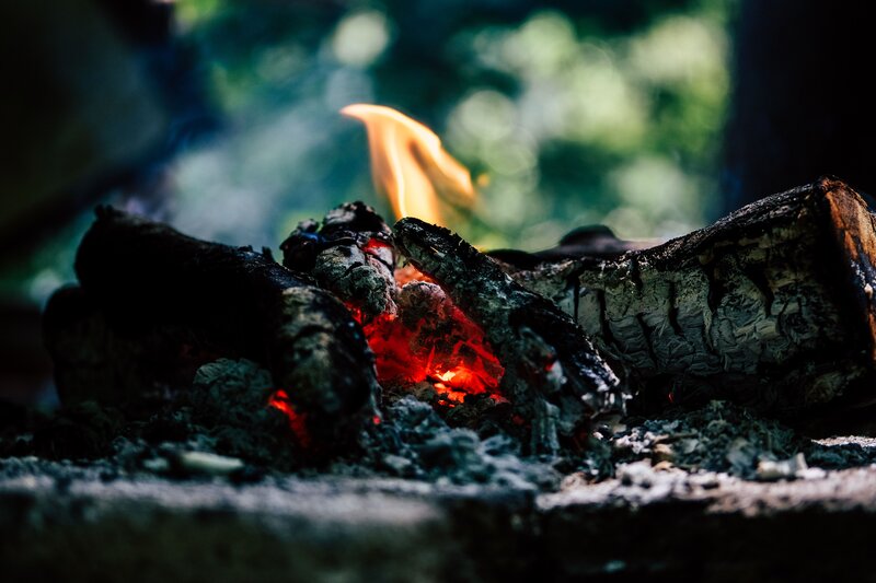 Campfire embers glowing