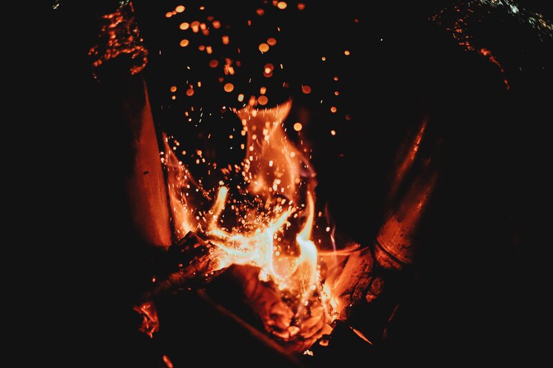 campfire sparks at night