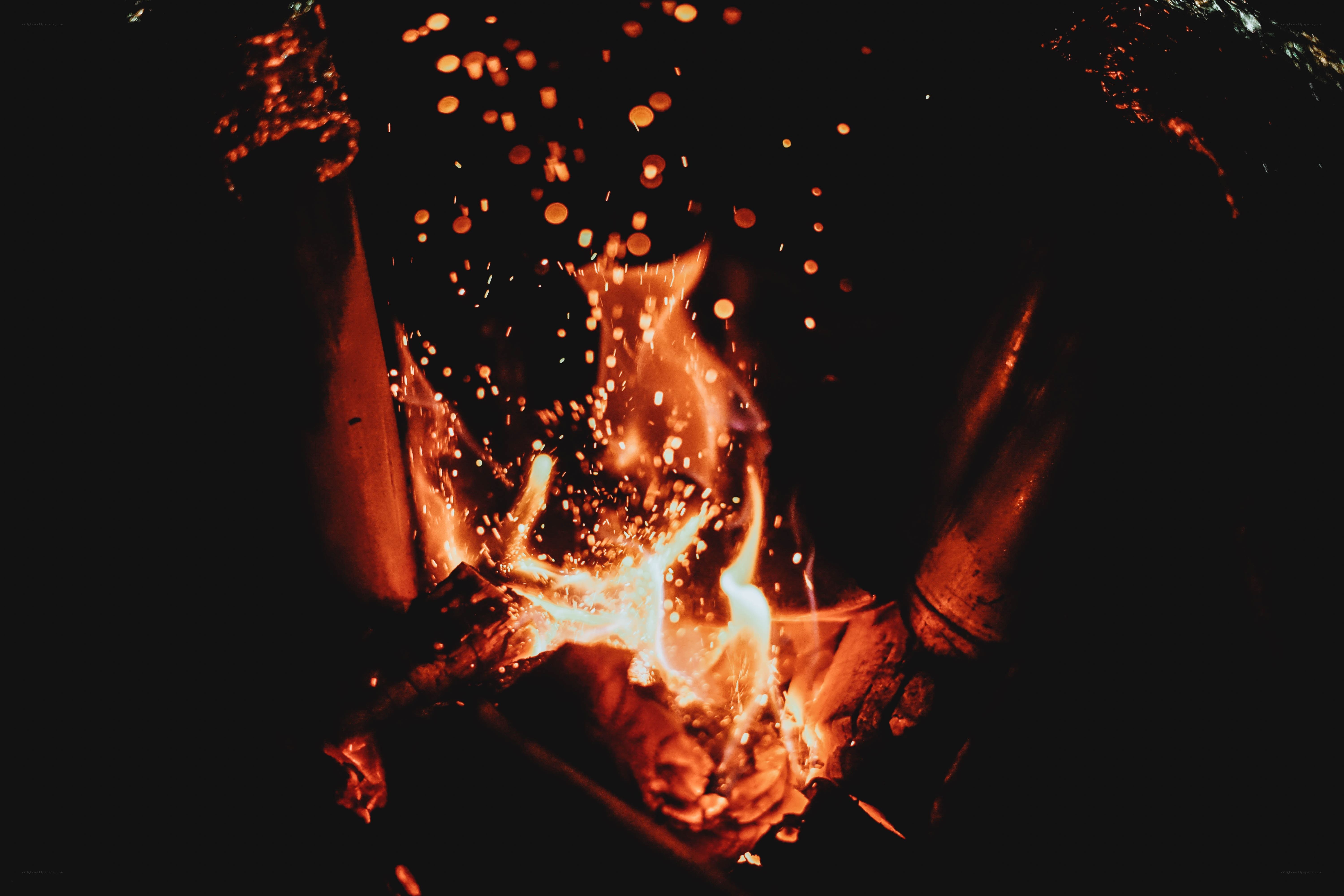 campfire sparks at night