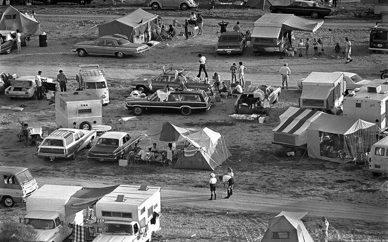Campground with vintage cars and tents