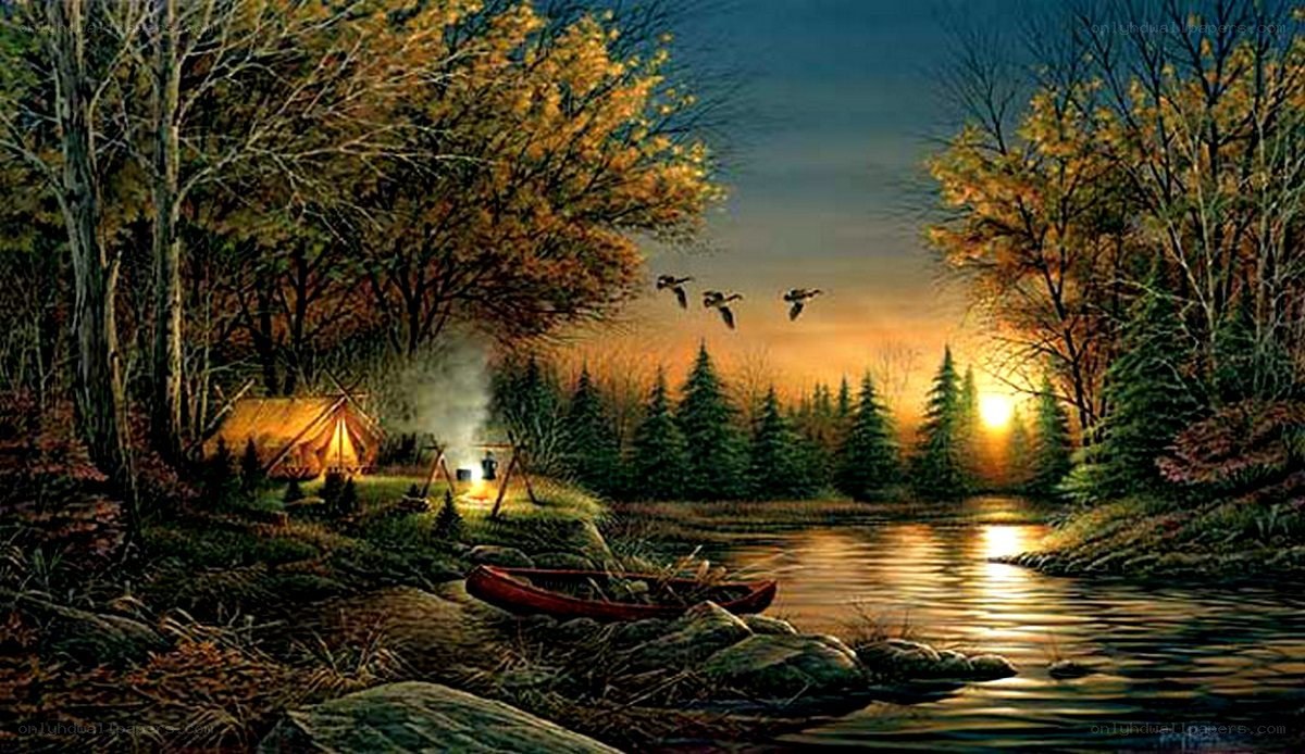 Camping by the river at sunset