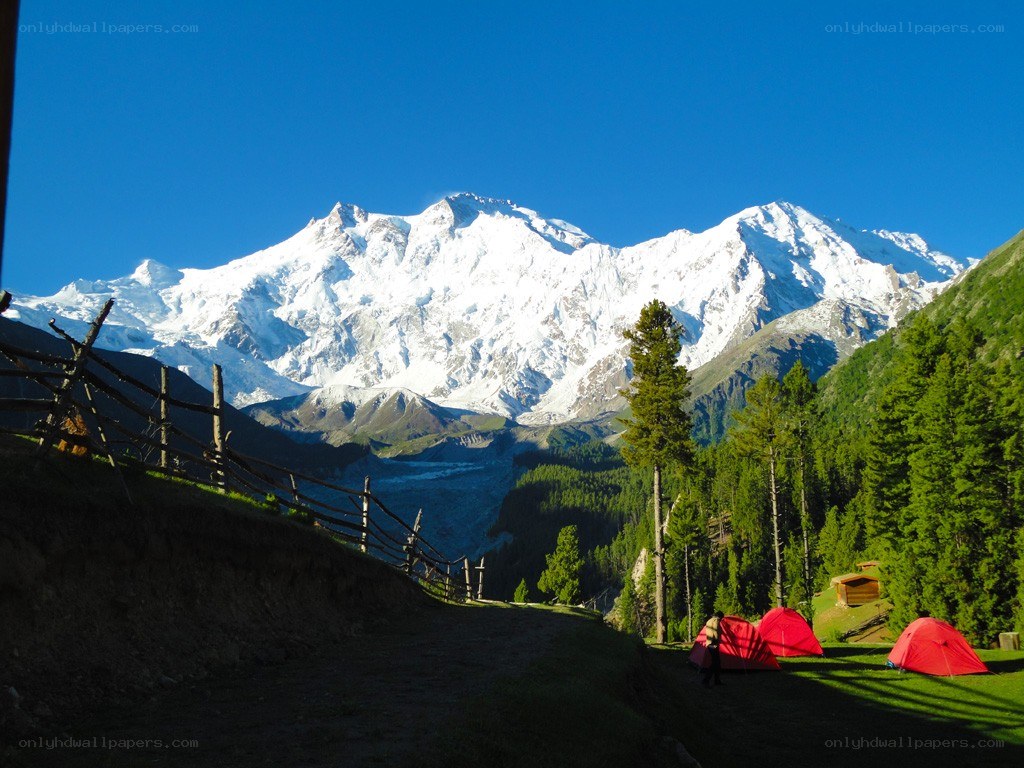 Campsite with snow-capped mountains