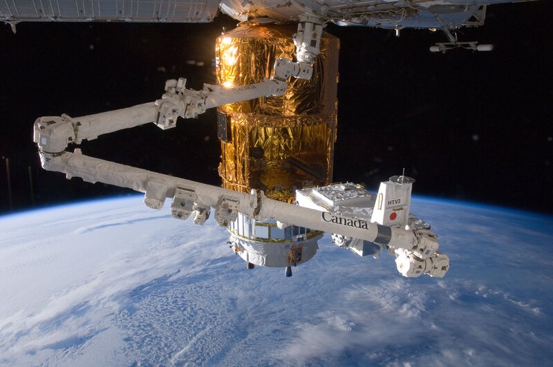 Canadarm2 servicing a satellite