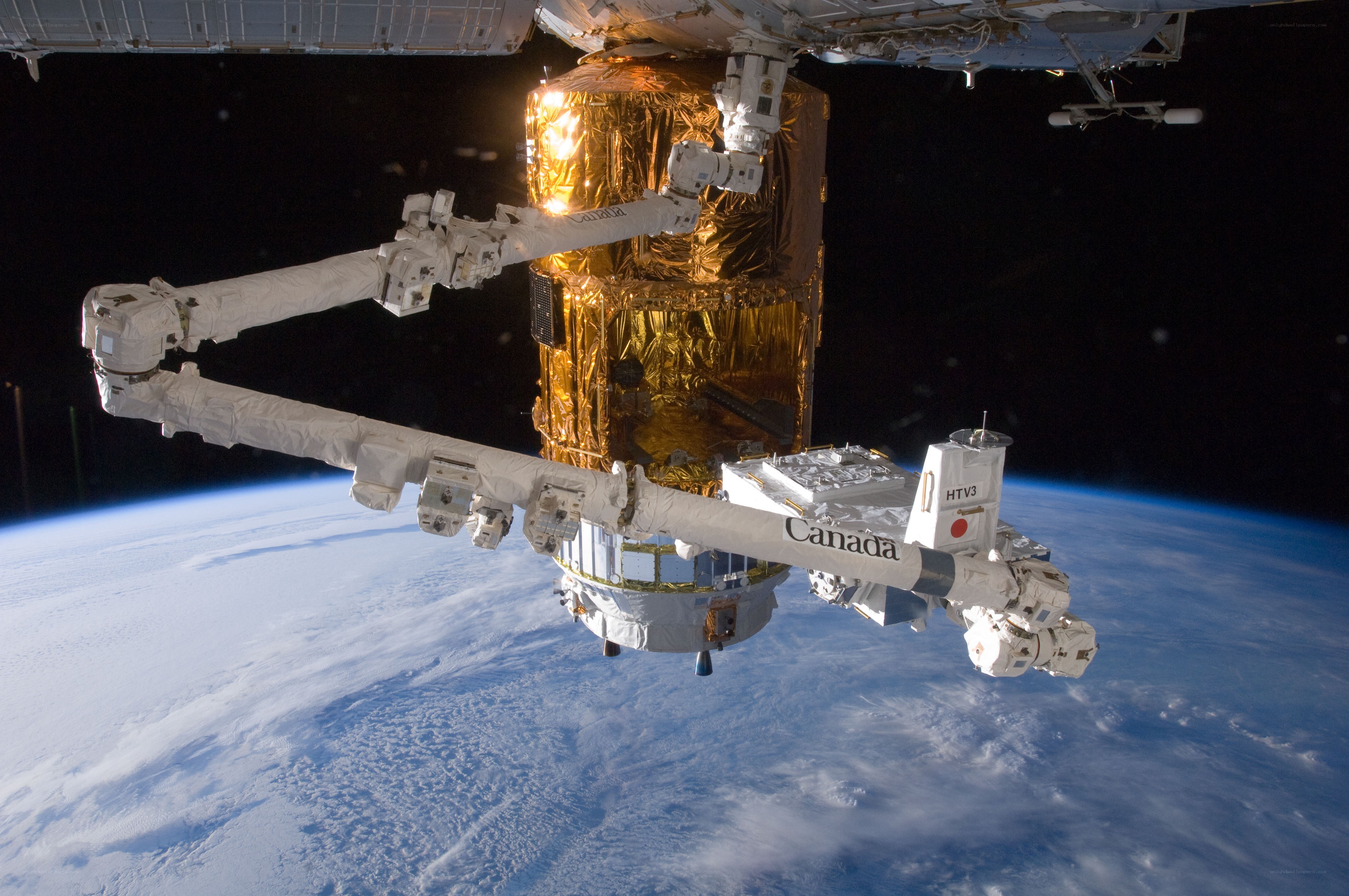 Canadarm2 servicing a satellite