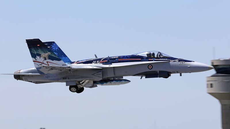 Canadian Fighter Jet — Blue, Clear, Afternoon