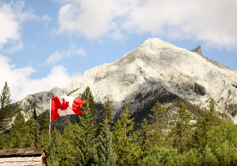 Canadian Flag in Mountains