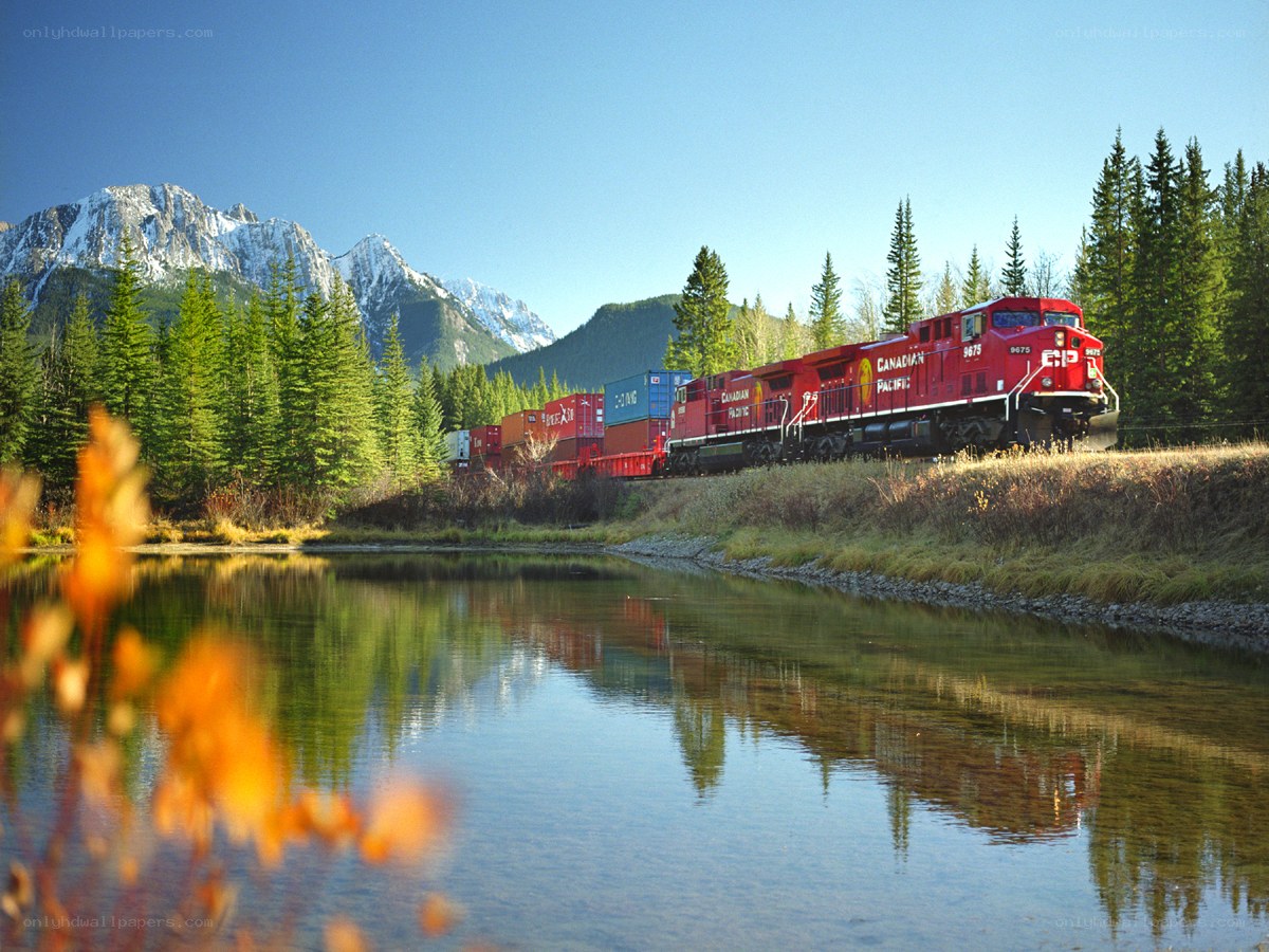 Canadian Pacific train in mountain landscape