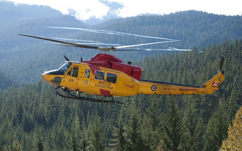 Canadian rescue helicopter in forest