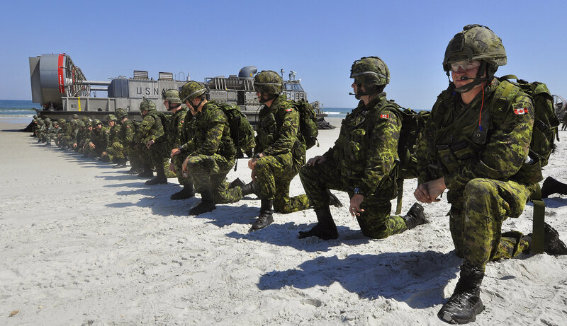 Canadian soldiers on beach landing