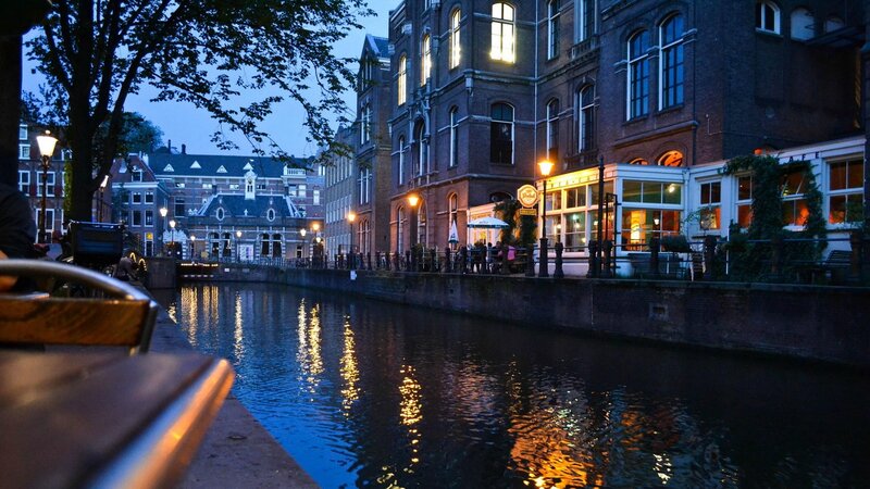 canal at dusk in amsterdam