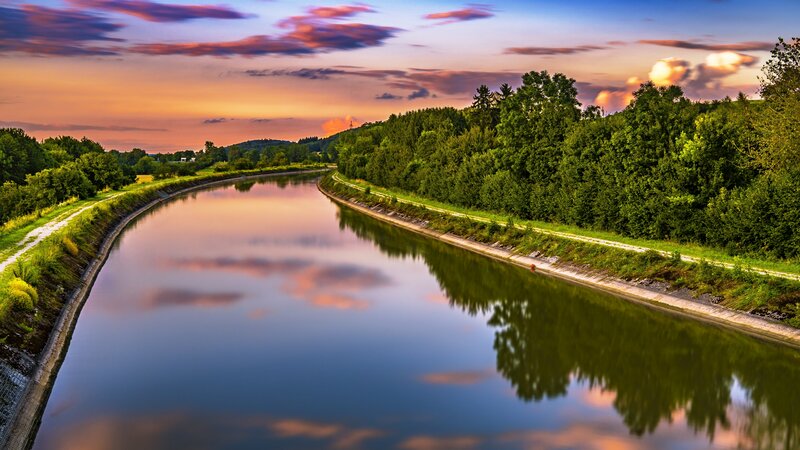Canal at sunset with colorful sky