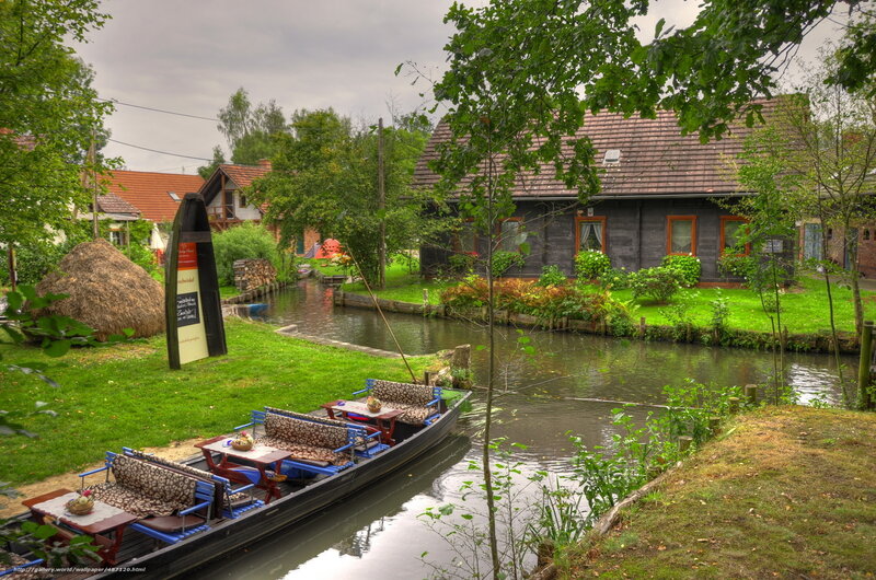 Canal boat in a village