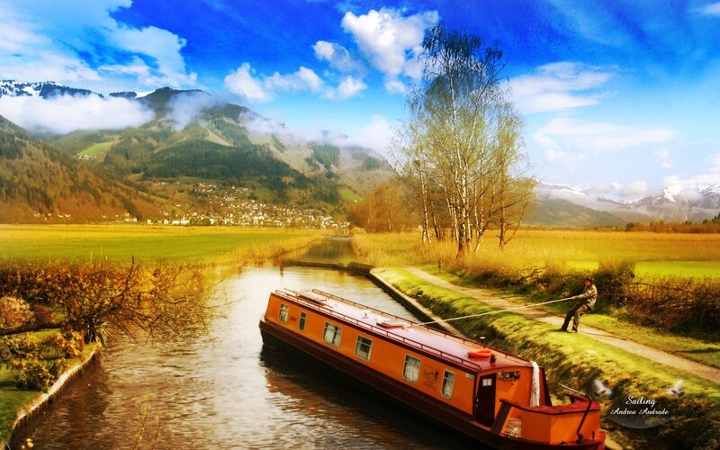 Canal boat in mountain valley