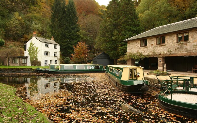 canal boats in autumn village