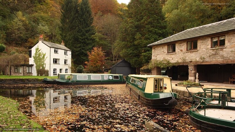 canal boats in autumn village