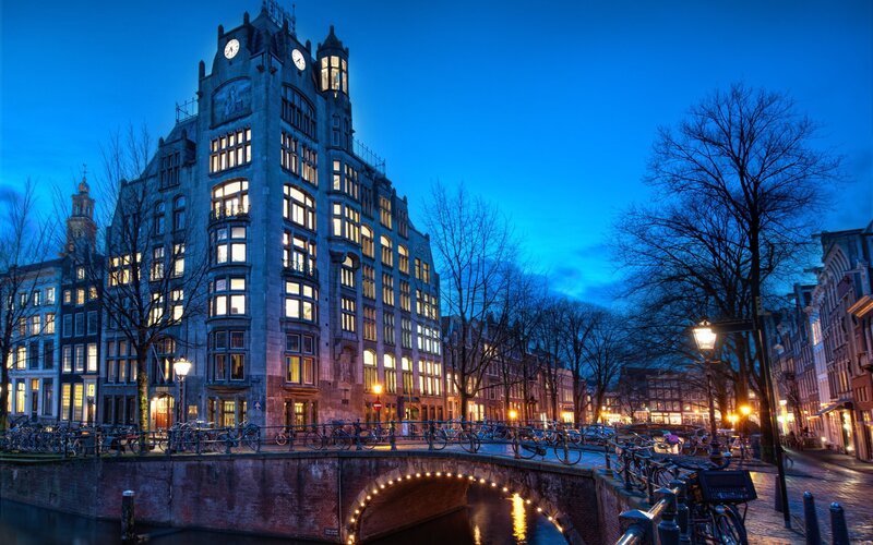 Canal Bridge at Dusk — Blue, Serene, Night, Photograph, Bicycles